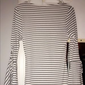 Cute fitted white dress with thin black stripes